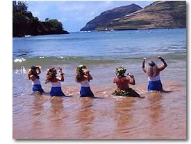 Halau members greet competitors in the Kaua`i World Challenge Canoe Race in Kalapaki